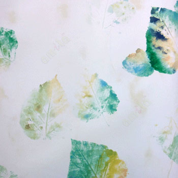 Green white brown blue color mixed in falling leafy wall in texture surface wallpaper