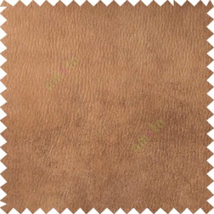 Gingerbread brown color solid texture finished surface suede and leather background texture gradients sofa fabric